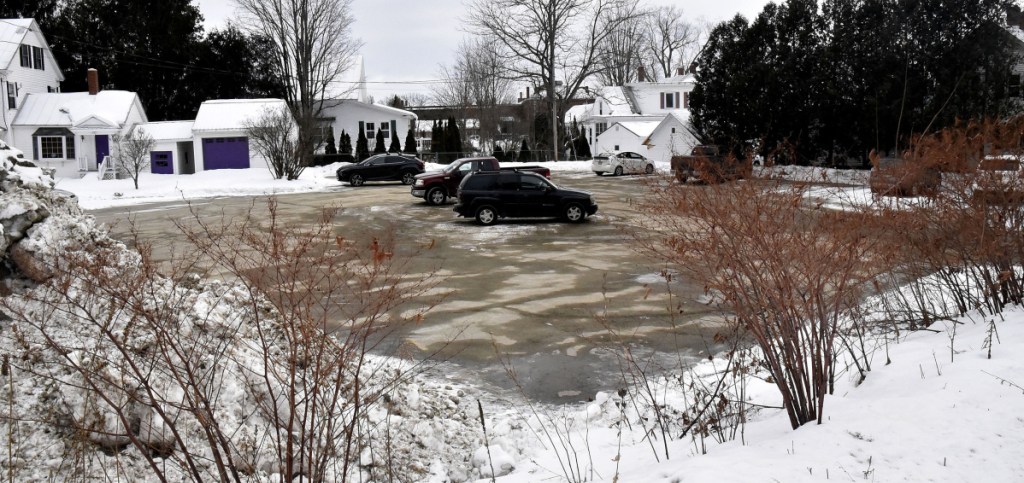 The town of Farmington will lease this parking lot off Anson Street in Farmington to help ease parking problems involving employees at the nearby Origin USA company.